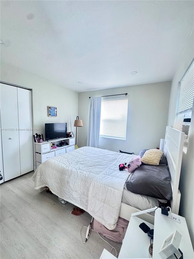 3731 SW 58th Ter, Davie, FL 33314 - bedroom featuring light wood-style floors and a closet