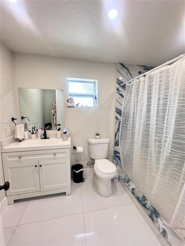 3731 SW 58th Ter, Davie, FL 33314 - bathroom with vanity, tile patterned flooring, and curtained shower