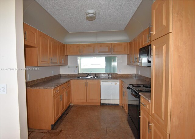 2601 N Nob Hill Rd Unit 405, Sunrise, FL 33322 - kitchen featuring black appliances, a sink, a textured ceiling, and light brown cabinets