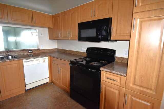 2601 N Nob Hill Rd Unit 405, Sunrise, FL 33322 - kitchen featuring black appliances, a sink, dark countertops, and tile patterned floors