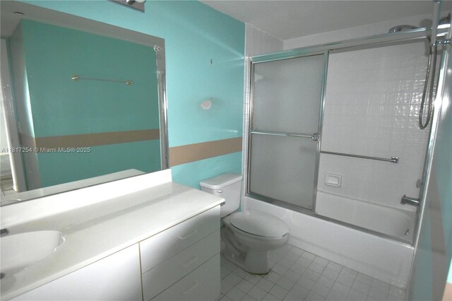 2601 N Nob Hill Rd Unit 405, Sunrise, FL 33322 - full bath with vanity, tile patterned flooring, toilet, and enclosed tub / shower combo