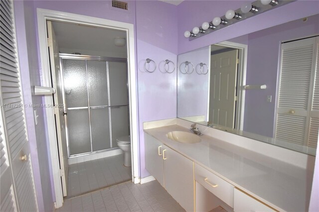 2601 N Nob Hill Rd Unit 405, Sunrise, FL 33322 - full bath with toilet, tile patterned floors, vanity, and a shower stall