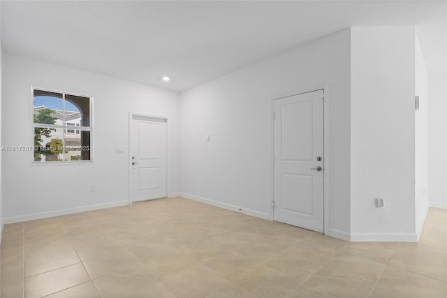 2608 SE 11th Ct Unit 2608, Homestead, FL 33035 - unfurnished room with baseboards, light tile patterned floors, and recessed lighting