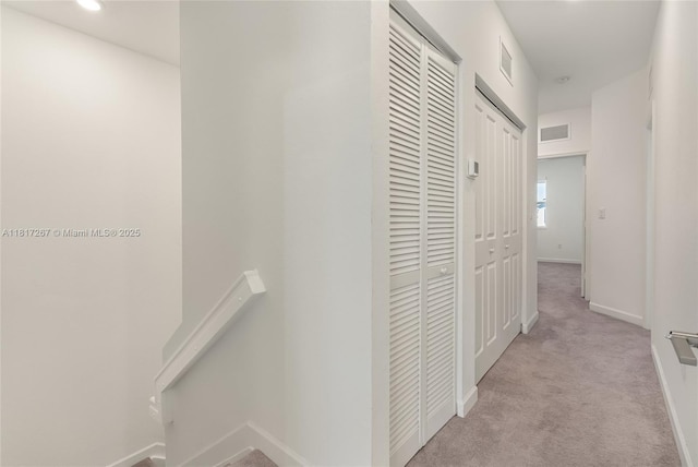 2608 SE 11th Ct Unit 2608, Homestead, FL 33035 - corridor featuring baseboards and light carpet