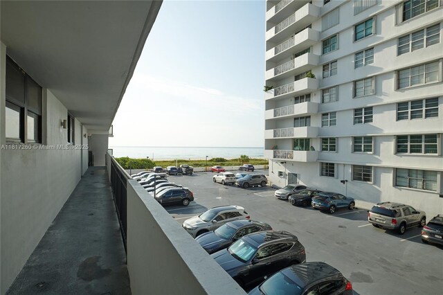 5845 Collins Ave Unit 304, Miami Beach, FL 33140 - uncovered parking lot featuring a water view