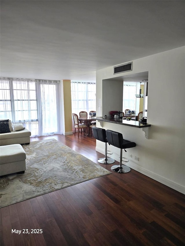 230 174th St Unit 1805, Sunny Isles Beach, FL 33160 - living area featuring wood finished floors and baseboards