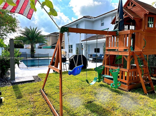 14121 SW 152nd Ter, Miami, FL 33177 - view of playground featuring a fenced backyard and a patio