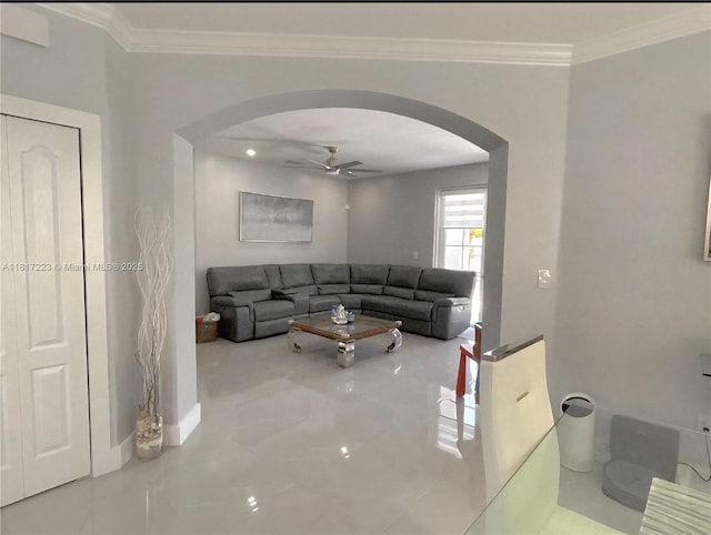 14121 SW 152nd Ter, Miami, FL 33177 - living room with arched walkways, ceiling fan, and ornamental molding