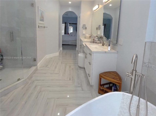 14121 SW 152nd Ter, Miami, FL 33177 - full bathroom featuring ensuite bath, a freestanding tub, double vanity, and a stall shower