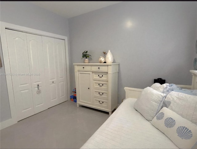 14121 SW 152nd Ter, Miami, FL 33177 - bedroom featuring concrete flooring and a closet