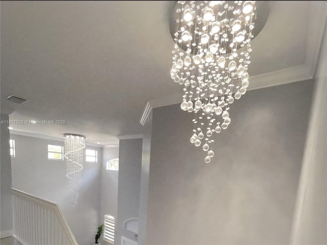 14121 SW 152nd Ter, Miami, FL 33177 - detailed view of crown molding and a chandelier