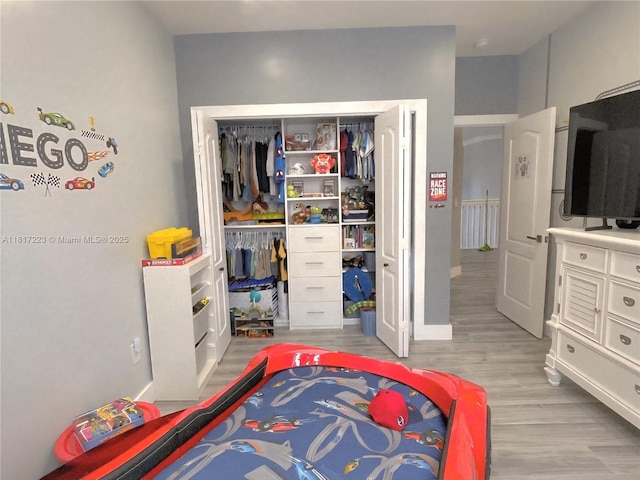 14121 SW 152nd Ter, Miami, FL 33177 - bedroom with a closet and wood finished floors