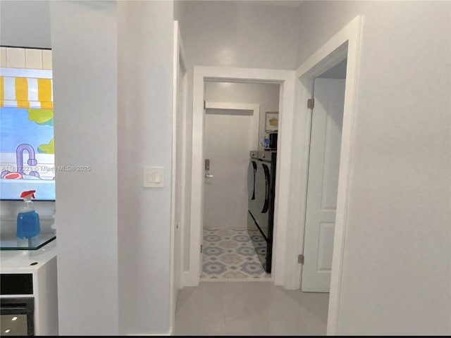 14121 SW 152nd Ter, Miami, FL 33177 - hallway featuring washer and clothes dryer and tile patterned floors