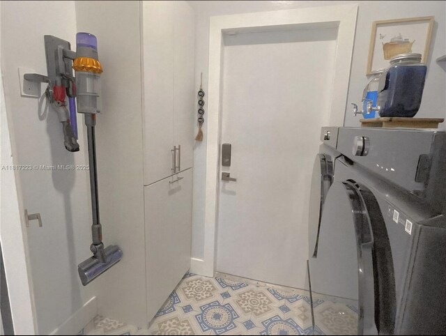 14121 SW 152nd Ter, Miami, FL 33177 - laundry area featuring separate washer and dryer and cabinet space