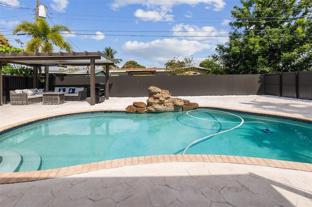 6541 NW 24th St, Sunrise, FL 33313 - view of swimming pool with outdoor lounge area, a fenced backyard, and a patio