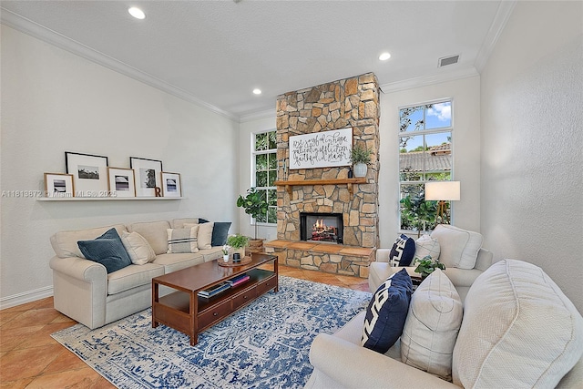112 Segovia Way, Jupiter, FL 33458 - living area featuring crown molding, plenty of natural light, recessed lighting, a stone fireplace, and baseboards
