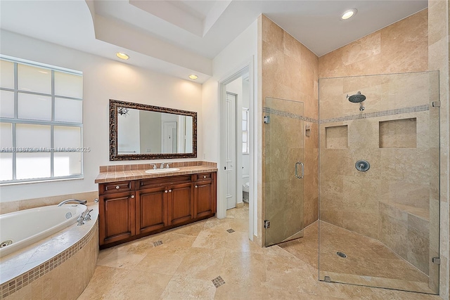 112 Segovia Way, Jupiter, FL 33458 - bathroom featuring a shower stall, a garden tub, toilet, vanity, and recessed lighting