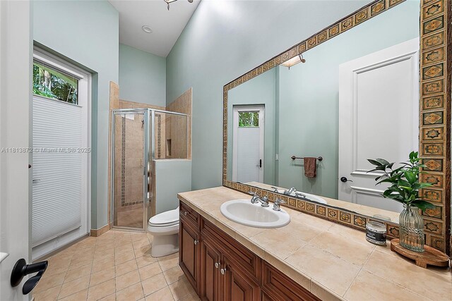 112 Segovia Way, Jupiter, FL 33458 - full bath featuring toilet, a shower stall, vanity, and tile patterned floors