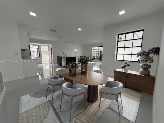 4314 SW 97th Ct, Miami, FL 33165 - dining area featuring baseboards, healthy amount of natural light, recessed lighting, and finished concrete flooring