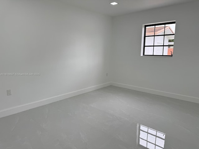 4314 SW 97th Ct, Miami, FL 33165 - unfurnished room featuring baseboards and concrete floors