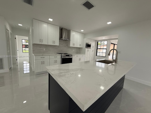 4314 SW 97th Ct, Miami, FL 33165 - kitchen featuring wall chimney exhaust hood, a sink, appliances with stainless steel finishes, baseboards, and decorative backsplash