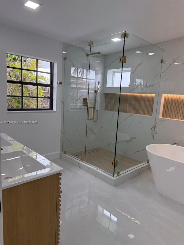 4314 SW 97th Ct, Miami, FL 33165 - full bath with a marble finish shower, a freestanding tub, double vanity, and marble finish floors