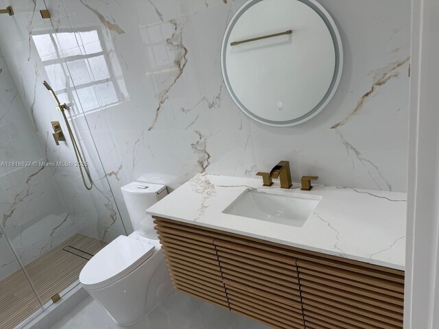 4314 SW 97th Ct, Miami, FL 33165 - full bathroom featuring vanity, a marble finish shower, toilet, and tile walls