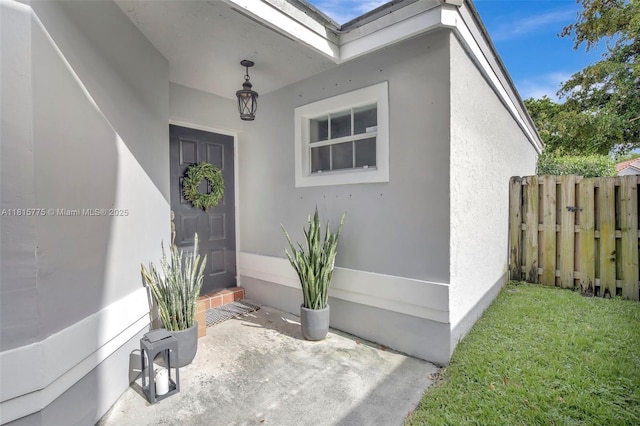 9012 Lake Park Cir S, Davie, FL 33328 - entrance to property with stucco siding and a patio area