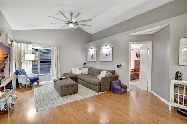 9012 Lake Park Cir S, Davie, FL 33328 - living room with a ceiling fan, lofted ceiling, wood finished floors, and baseboards