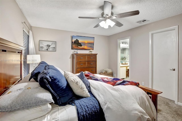 9012 Lake Park Cir S, Davie, FL 33328 - carpeted bedroom featuring a textured ceiling, a ceiling fan, and connected bathroom