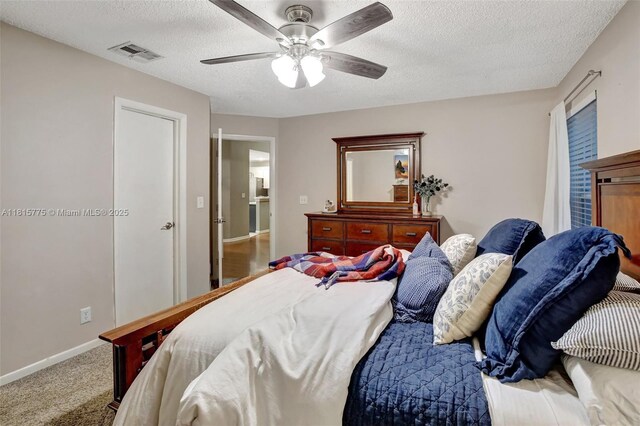 9012 Lake Park Cir S, Davie, FL 33328 - carpeted bedroom featuring a textured ceiling, a ceiling fan, and baseboards