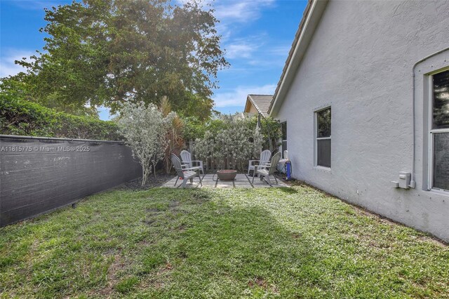 9012 Lake Park Cir S, Davie, FL 33328 - view of yard with a patio area and a fire pit