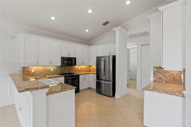 7215 Great Falls Cir, Boynton Beach, FL 33437 - kitchen with black appliances, a sink, a peninsula, light stone counters, and ornamental molding