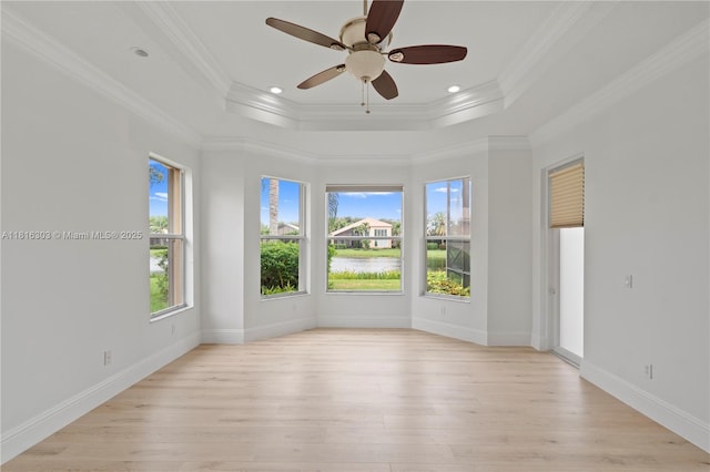 7215 Great Falls Cir, Boynton Beach, FL 33437 - unfurnished room with a tray ceiling, a ceiling fan, light wood-type flooring, crown molding, and baseboards