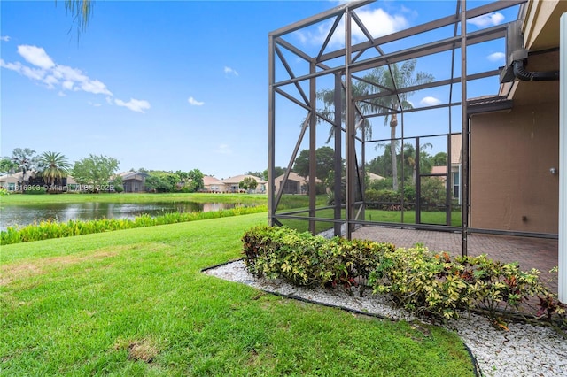 7215 Great Falls Cir, Boynton Beach, FL 33437 - view of grassy yard with glass enclosure, a water view, and a residential view