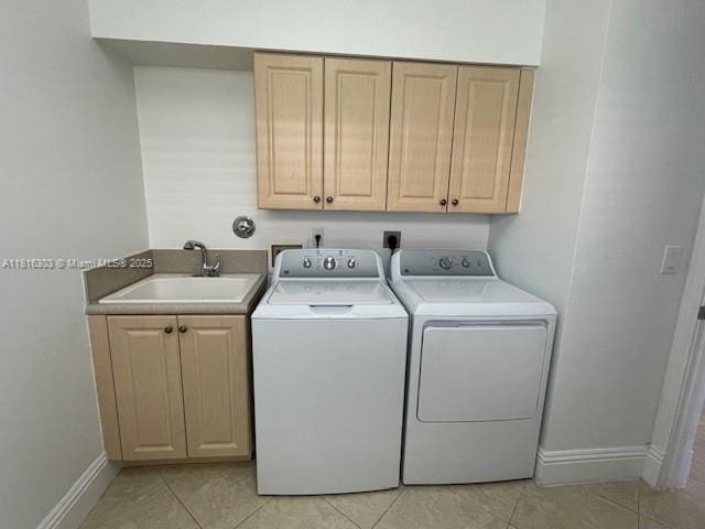 7215 Great Falls Cir, Boynton Beach, FL 33437 - laundry area with washing machine and dryer, cabinet space, and light tile patterned flooring