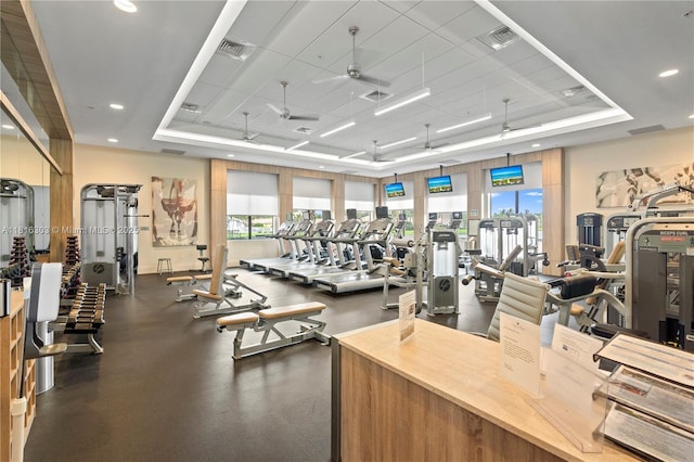 7215 Great Falls Cir, Boynton Beach, FL 33437 - gym featuring a raised ceiling, ceiling fan, and recessed lighting