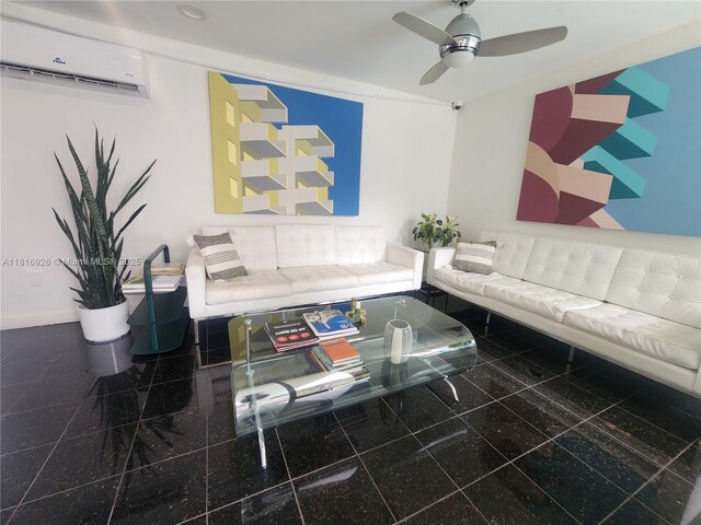 1455 W Ave Unit 202, Miami Beach, FL 33139 - living area featuring granite tiled floors, an AC wall unit, ceiling fan, and baseboards