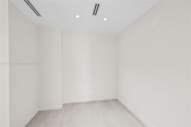 5700 Collins Ave Unit 7A, Miami Beach, FL 33140 - unfurnished room featuring light wood-type flooring and baseboards