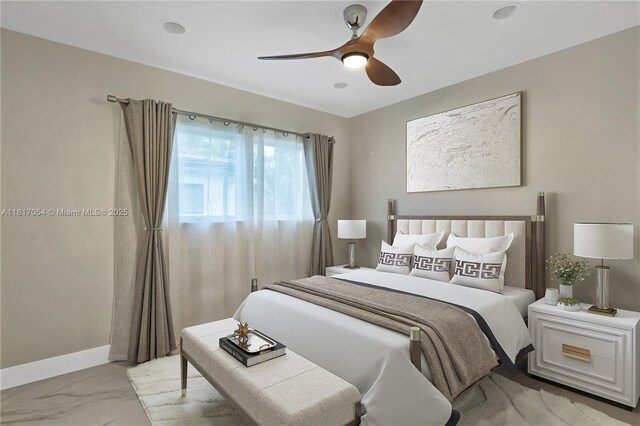 12985 Ortega Ln, North Miami, FL 33181 - bedroom with ceiling fan, baseboards, and marble finish flooring