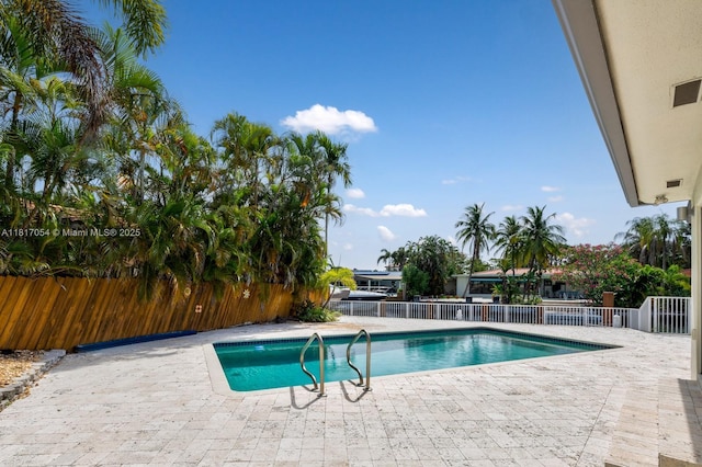 12985 Ortega Ln, North Miami, FL 33181 - view of pool with a patio
