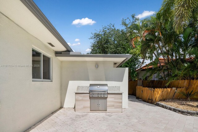 12985 Ortega Ln, North Miami, FL 33181 - view of patio / terrace