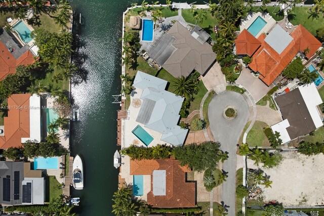 12985 Ortega Ln, North Miami, FL 33181 - aerial perspective of suburban area with a pool and a large body of water