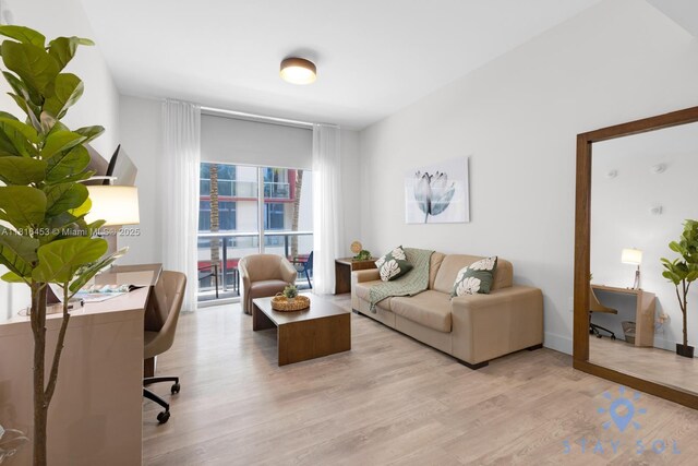 777 N Ocean Dr Unit N219, Hollywood, FL 33019 - living area featuring light wood-style floors and an office area
