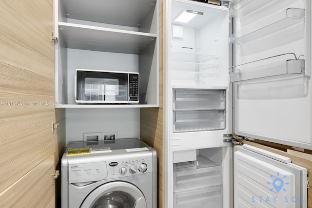 777 N Ocean Dr Unit N219, Hollywood, FL 33019 - washroom featuring washer / dryer