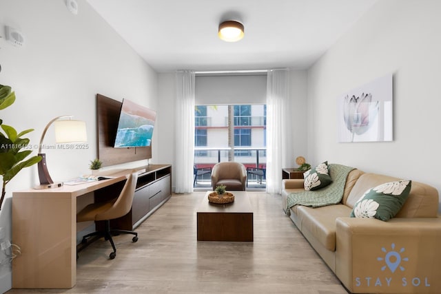 777 N Ocean Dr Unit N219, Hollywood, FL 33019 - living room with light wood-type flooring and a desk