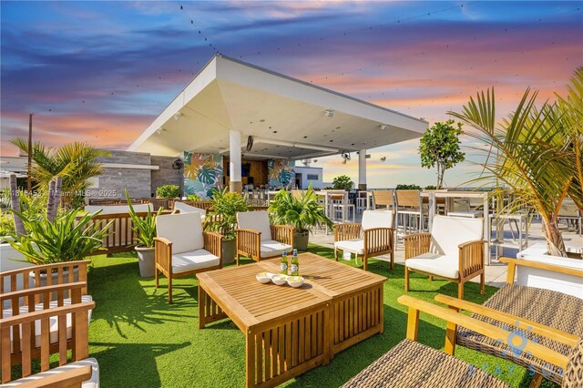 777 N Ocean Dr Unit N219, Hollywood, FL 33019 - wooden terrace featuring a lawn