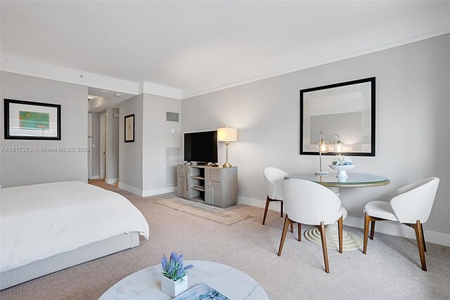 1435 Brickell Ave Unit 3111, Miami, FL 33131 - bedroom with carpet, baseboards, and crown molding