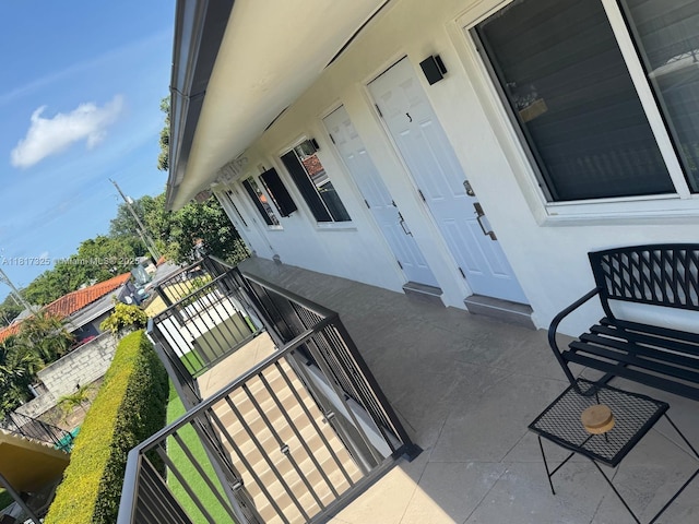 251 NW 57th Ave, Miami, FL 33126 - property entrance featuring stucco siding
