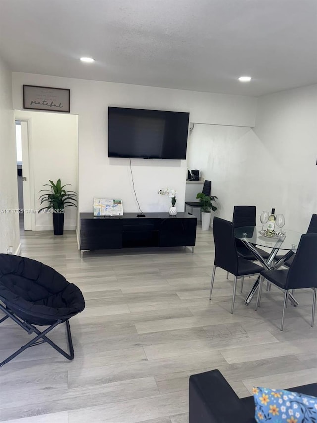 251 NW 57th Ave, Miami, FL 33126 - living room featuring recessed lighting and light wood-type flooring